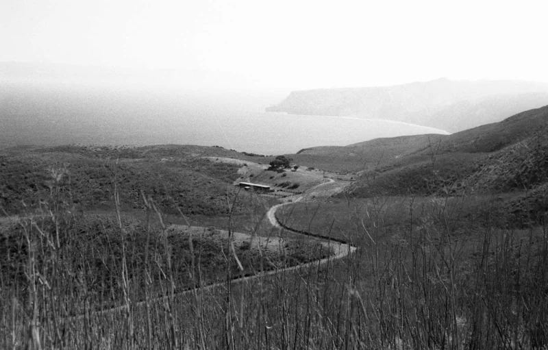 A winding road crosses the coastal hills of Santa Cruz Island.
